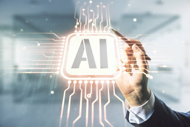 istock Man hand with pen working with abstract virtual artificial Intelligence symbol hologram on blurred office background. Multiexposure 1327618895