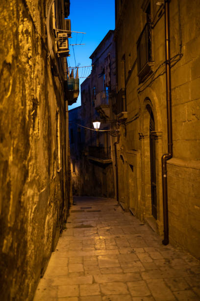 istock Taranto old city streets at night 1327618994