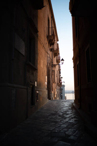 istock Taranto old city streets at night 1327618995
