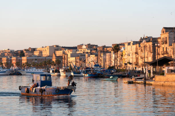 Sea port. Ships and boats at dawn. Sea town. Taranto stock photo