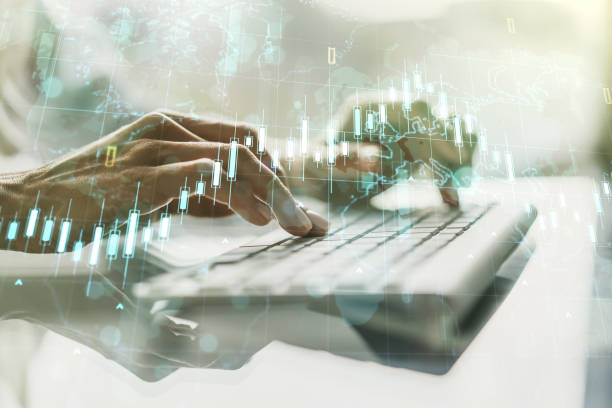 istock Multi exposure of abstract financial diagram with world map and with hand typing on computer keyboard on background, banking and accounting concept 1327620176