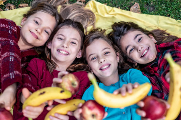 istock Girls at a picnic 1327620727