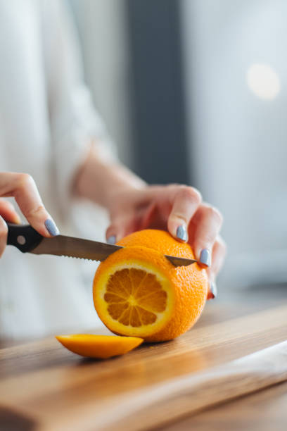istock Beautiful woman in her kitchen 1327620999