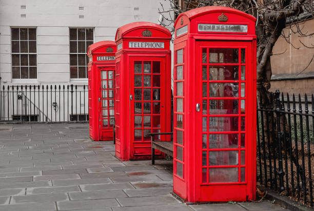 istock Traditional British red telephone boxes in a row 1327622039