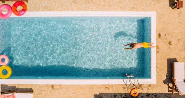 istock Relaxing moments at the swimming pool 1327625011