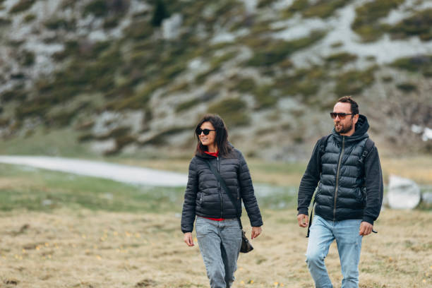 istock Couple hiking at the mountain top 1327625216