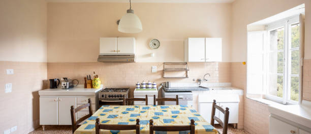 istock Interior of a large Italian country kitchen. Nobody inside. Frontal view 1327629068