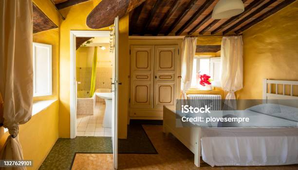 Old Double Bedroom With Bathroom Inside Stock Photo - Download Image Now - Yellow, Bedroom, Bathroom
