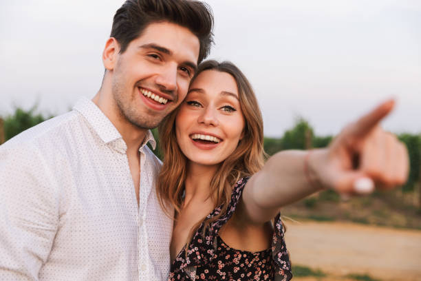 istock Loving couple outdoors hugging with each other. 1327630611