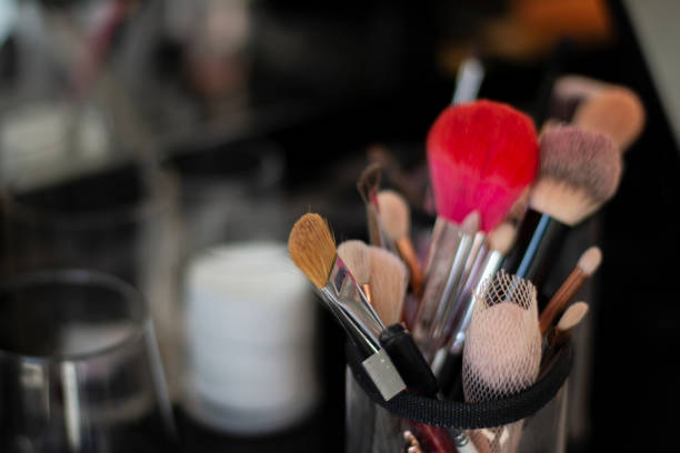 istock Professional makeup brushes in a tube on a blur background 1327633413