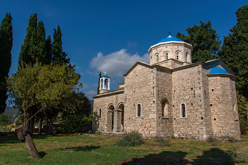 Blue domed church in the hills of Samos Island.