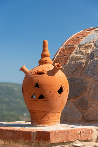 Panoramic collage of ceramic jugs, vase amphorae isolated on white background.