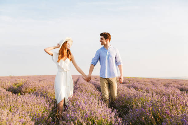 istock Cheery young couple embracing at the lavender field 1327634471