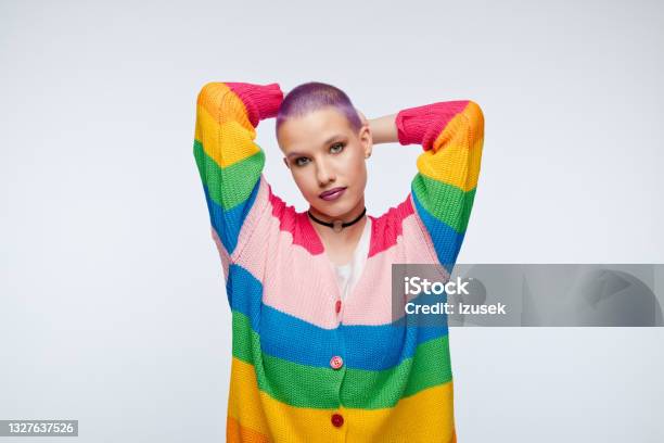 Friendly Young Woman With Short Purple Hair And Rainbow Cardigan Stock Photo - Download Image Now