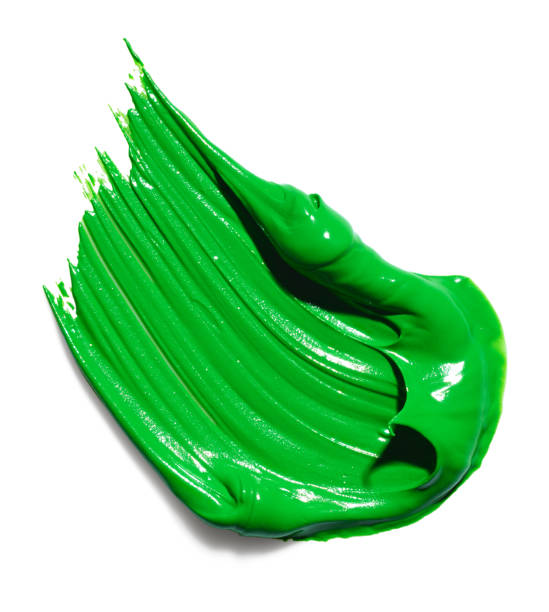 Green paint stroke over white isolated background stock photo