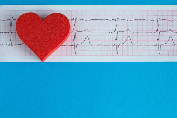 istock Red heart  and cardiogram on the blue  background. Top view. 1327649057