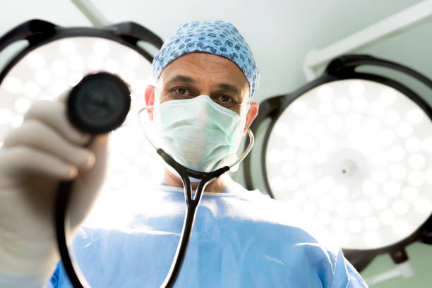 istock Specialist doctor with stethoscope in operating room. 1327650094