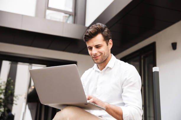 istock Portrait of a smiling young formal dressed man 1327650289