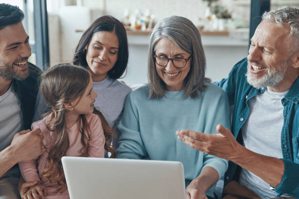 istock Modern family spending time together and smiling 1327652401