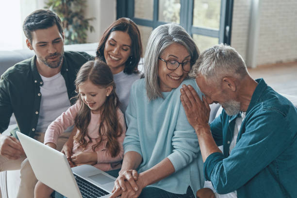 istock Modern family spending time together and smiling 1327653107
