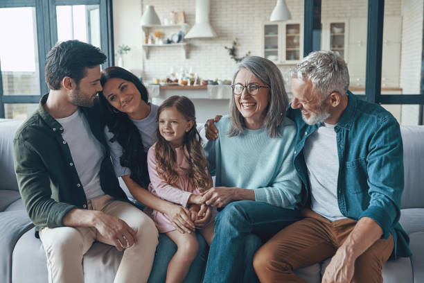 istock Happy family spending time together and smiling 1327653725
