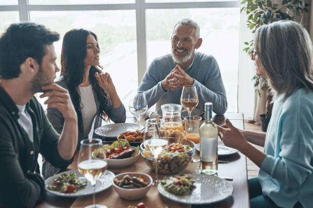 istock Happy multi-generation family communicating and smiling 1327653837