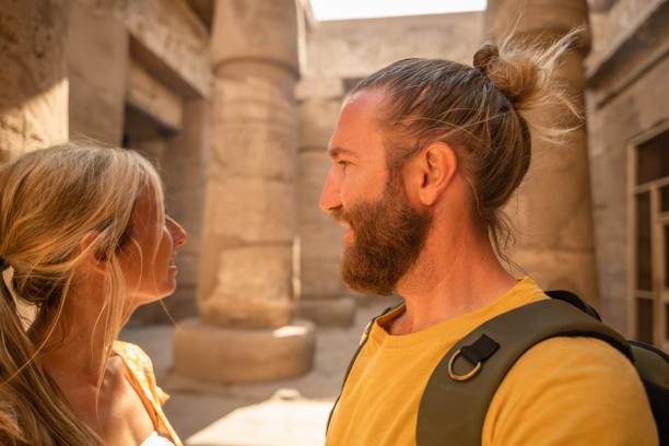 istock Couple travel in Egypt, explore the ancient temples in Luxor 1327655698