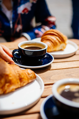 Breakfast with croissants, coffee