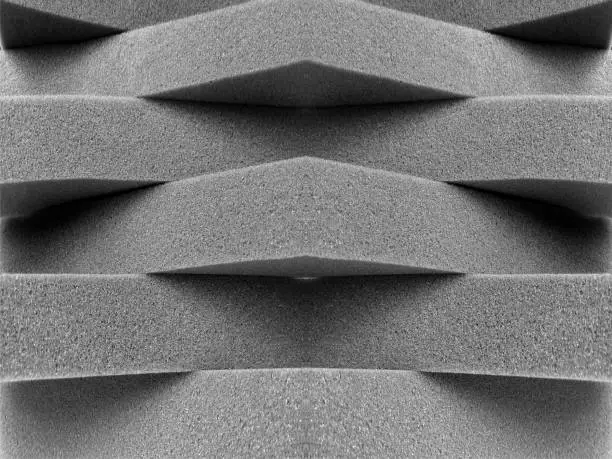 Photo of stacked gray sponge foam material