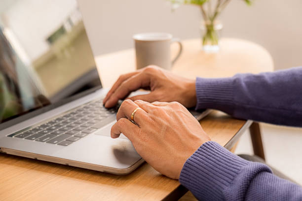 istock Asian Business Using Laptop Computer Online Working from Home 1327664491