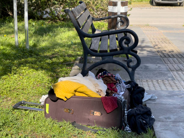 istock Clothes thrown to the puplic park 1327677918