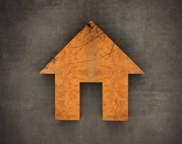 men made of paper and paper house.the concept of a mortgage.photo with copy space