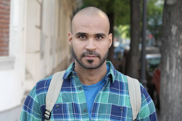 istock Very cute ethnic man on the street 1327681323