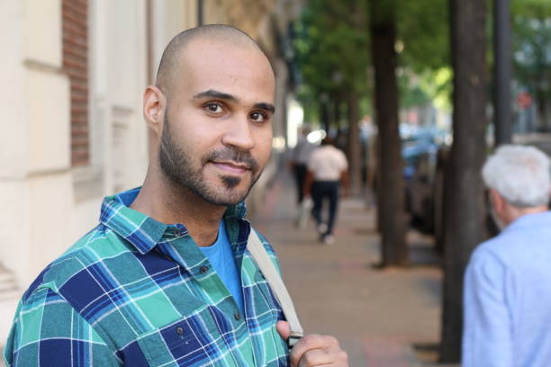 istock Very cute ethnic man on the street 1327681341