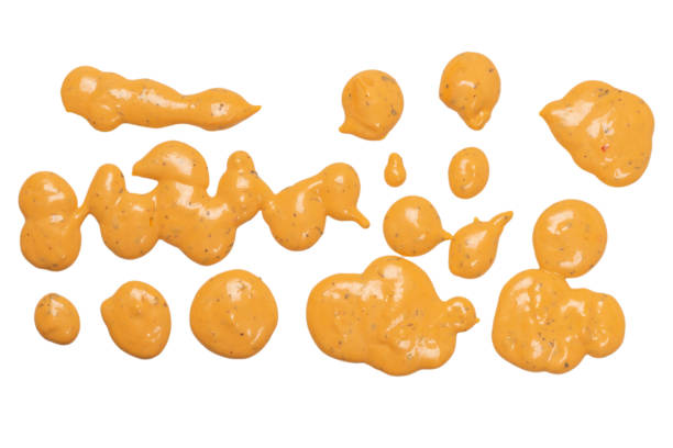 istock Whipped delicious sauce splashes isolated on a white background. 1327682990