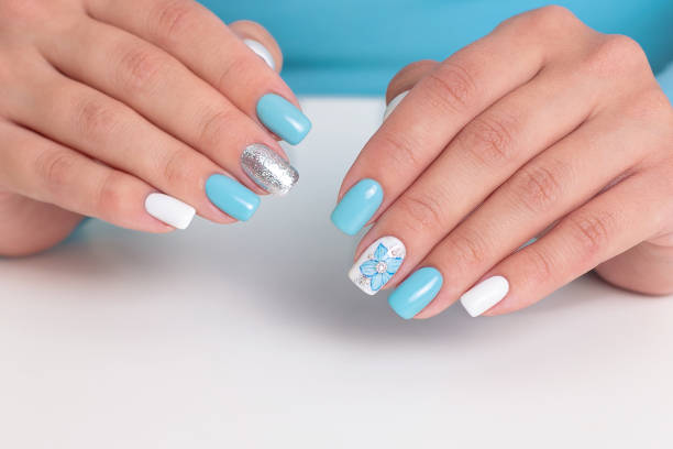 istock Female hands with romantic manicure nails 1327685529