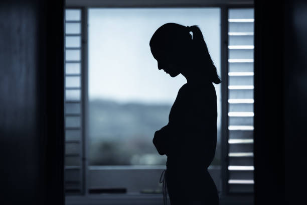 istock Sad woman at home 1327685699
