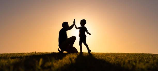 istock Father and son giving a high five. We Rea great team! 1327688014