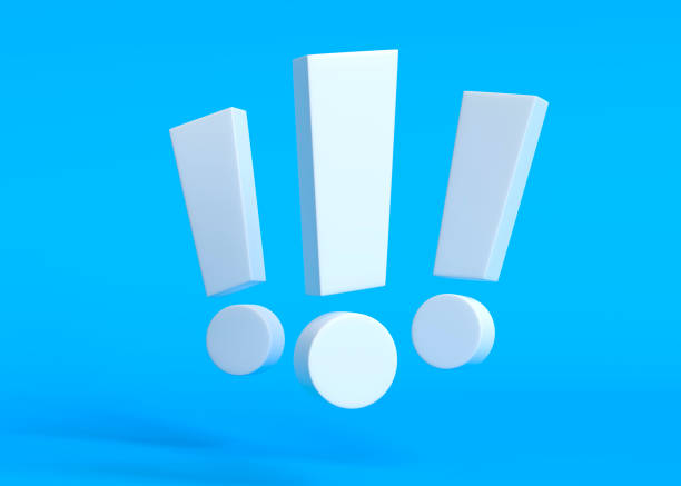 istock Group of white exclamation marks on blue background 1327690571