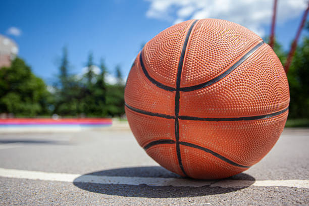 istock A basketball swishes through the net 1327697142