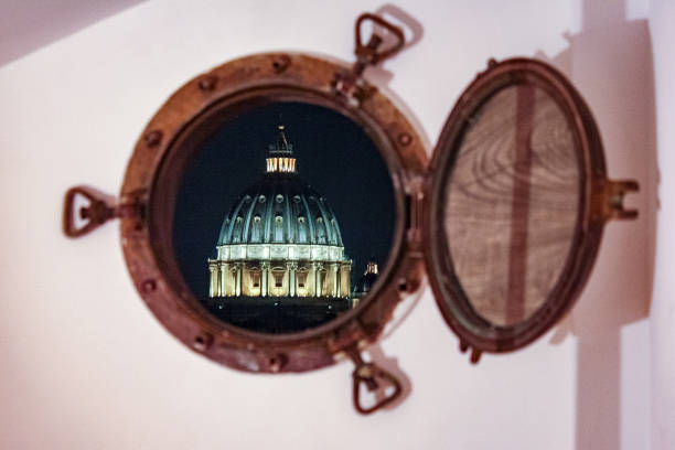 View on st. Peter's basilica in Rome, Italy, taken through a window in December 2019.