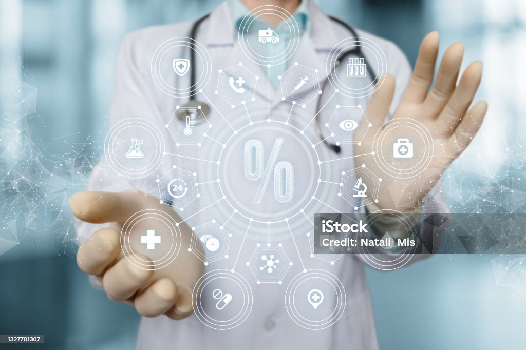 Medical services discount concept. Medical services discount concept. Doctor showing a hologram percent blurred background. Marketing Stock Photo