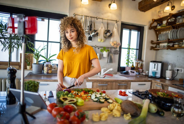 istock Food blogger recording video tutorial at home 1327702458