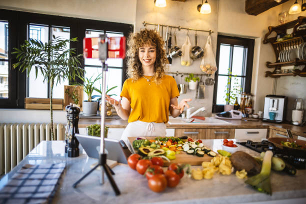 istock Food blogger recording video tutorial at home 1327702478