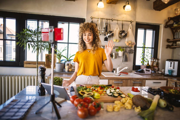 istock Food blogger recording video tutorial at home 1327702497