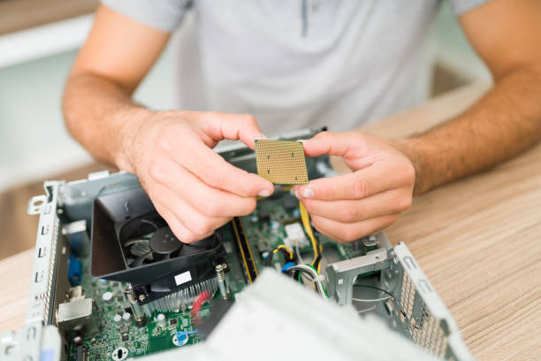 istock Engineer ready to install a new microchip at the repair shop 1327702520