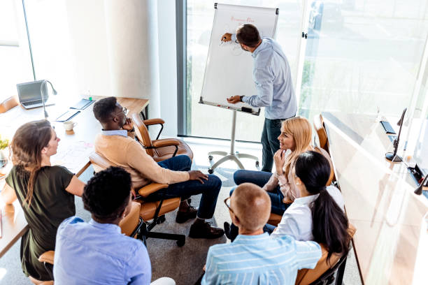 istock Creative business people working on business project in office 1327703213