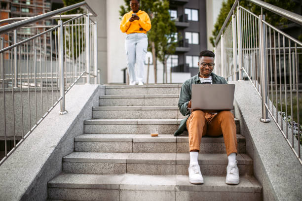 istock Finishing work on laptop in public park 1327703429