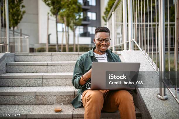 Using Laptop For Studying Outdoor Stock Photo - Download Image Now - University Student, Laptop, Student