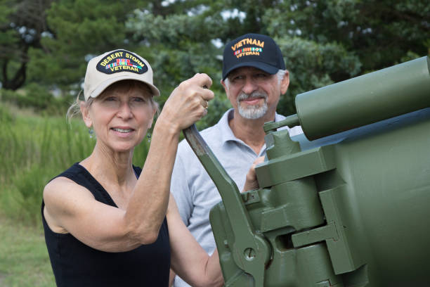istock Military veterans jokingly getting ready to fire artillery 1327713585